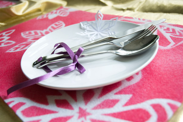 Set your pretty holiday table with these easy snowflake placemats.