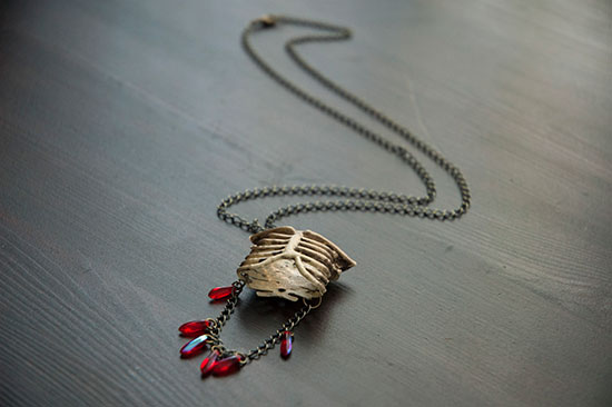 Make this spooky skeleton necklace out of a dollar store decoration!